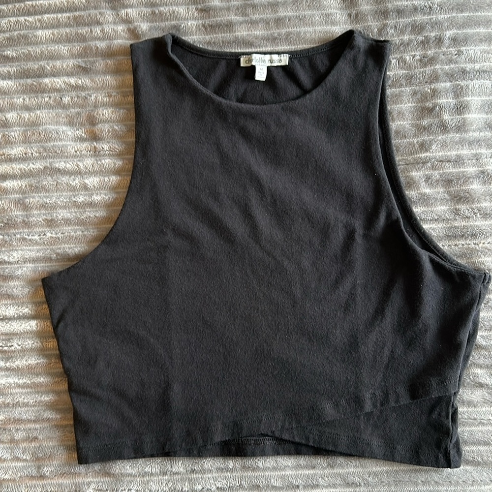 Midriff pullover cross-flap summer top; 95% cotton/ 5% spandex.